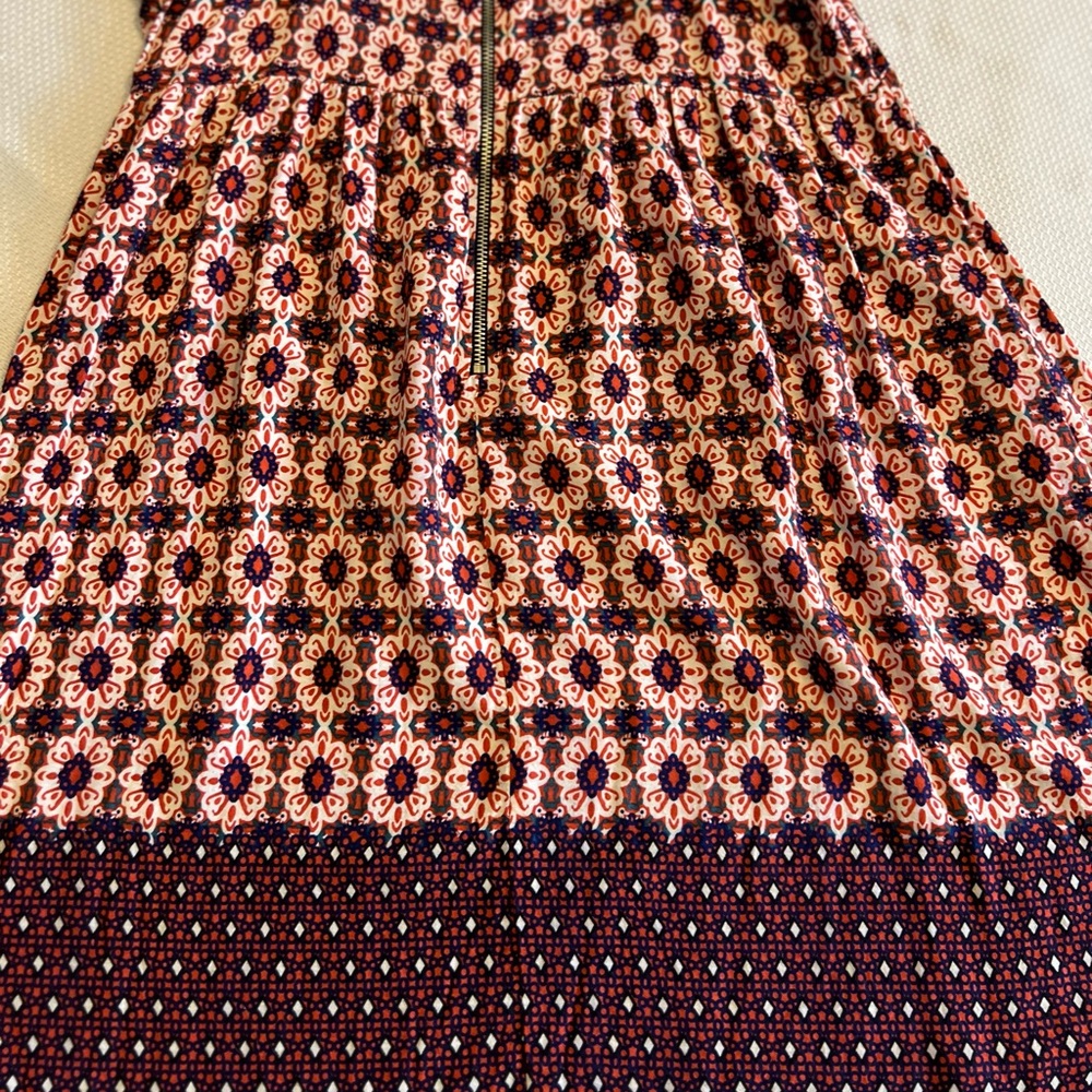 Intu  cold shoulder dress with rust navy blue black and white pattern.  Size XS - Picture 3 of 5